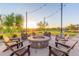 Outdoor fire pit area featuring comfortable seating perfect for evening gatherings at 7165 S Bruins Rd, Gold Canyon, AZ 85118