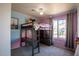 bedroom featuring a bunk bed with a built-in desk and colorful wall decor at 723 W Canary Way, Chandler, AZ 85286