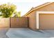 This home has a two car garage with a gated driveway, and neat landscaping at 723 W Canary Way, Chandler, AZ 85286