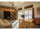 Living room featuring lofted bed, comfortable seating, and natural light perfect for relaxing and entertaining guests at 723 W Canary Way, Chandler, AZ 85286