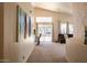 Bright and airy living room featuring a vaulted ceiling, a view of the pool and stylish decor at 723 W Canary Way, Chandler, AZ 85286