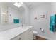 Well-lit bathroom featuring a skylight, an undermount sink, and modern finishes for a luxurious feel at 7325 E Northland Dr # 12, Scottsdale, AZ 85251