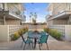 Outdoor courtyard with seating, manicured landscaping and view of the community pool at 7325 E Northland Dr # 12, Scottsdale, AZ 85251