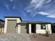 Charming single-story home with a two-car garage and beautiful desert landscaping at 7654 W Tether Trl, Peoria, AZ 85383