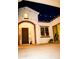 Charming home exterior illuminated by string lights and a welcoming entrance at 9405 S 47Th Ave, Laveen, AZ 85339