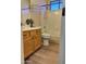 Cozy bathroom featuring modern fixtures, wood vanity, and shower-over-tub at 104 W Windsong Dr, Phoenix, AZ 85045