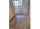 Bedroom featuring neutral carpet and windows for natural light at 104 W Windsong Dr, Phoenix, AZ 85045