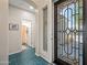 Inviting entryway showcasing stylish tile flooring, a decorative door, and tastefully decorated walls, setting an elegant tone at 104 W Windsong Dr, Phoenix, AZ 85045