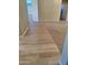 Hallway with wood flooring leading to other parts of the house at 104 W Windsong Dr, Phoenix, AZ 85045