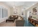 Inviting living room with neutral color palette, plush seating, and elegant decor for comfortable living at 104 W Windsong Dr, Phoenix, AZ 85045