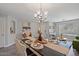 Elegant dining room with a chandelier and neutral decor at 1200 E Penny Ln, San Tan Valley, AZ 85140