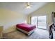 Bright bedroom featuring a sliding glass door offering access to an outdoor space at 122 Leisure World --, Mesa, AZ 85206