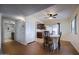 Bright dining area with laminate flooring and access to the kitchen and a full bathroom at 122 Leisure World --, Mesa, AZ 85206