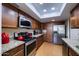 Modern kitchen featuring stainless steel appliances, granite countertops, and ample cabinet space at 122 Leisure World --, Mesa, AZ 85206