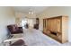 Spacious living room with high ceilings, plush carpeting, and plenty of natural light at 122 Leisure World --, Mesa, AZ 85206