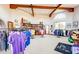 A golf pro shop features a variety of golf apparel and equipment, with wooden beams and arched windows at 122 Leisure World --, Mesa, AZ 85206