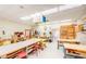 Large work room features equipment and storage for hobbies and projects at 122 Leisure World --, Mesa, AZ 85206