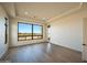 Large bedroom featuring hardwood floors and a picturesque view at 12870 E Rosewood Dr, Scottsdale, AZ 85255