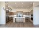 Spacious kitchen featuring a central island, stainless steel appliances, and ample cabinetry at 12870 E Rosewood Dr, Scottsdale, AZ 85255