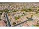Aerial view of a neighborhood featuring single-Gathering homes, pools, and tree-lined streets at 1310 S Vine Ct, Gilbert, AZ 85233