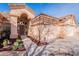 Charming single-story home featuring a well-maintained front yard and an attached two-car garage at 1310 S Vine Ct, Gilbert, AZ 85233
