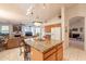 Open floor plan showcasing the kitchen island with granite counters, connecting to the living spaces at 1310 S Vine Ct, Gilbert, AZ 85233