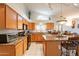 Bright and airy kitchen featuring a large island, modern appliances, and ample cabinet space at 1310 S Vine Ct, Gilbert, AZ 85233