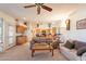 Open-concept living space that seamlessly connects to the kitchen, offering a relaxed and inviting atmosphere at 1310 S Vine Ct, Gilbert, AZ 85233