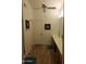 Bright bathroom features a ceiling fan, wood floors, and a vanity with double sinks at 13820 S 41St Way, Phoenix, AZ 85044