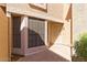 Private entryway featuring security door, stylish windows, and beautiful plants at 13820 S 41St Way, Phoenix, AZ 85044