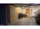 Spacious garage featuring ample storage cabinets and parking space for vehicles at 13820 S 41St Way, Phoenix, AZ 85044