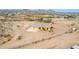 Desert home featuring attached two-car garage with expansive fenced-in yard and mountain views at 1600 W Ivar Rd, San Tan Valley, AZ 85144