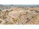 Sweeping aerial shot of a desert home, emphasizing its significant lot size and peaceful residential setting at 1600 W Ivar Rd, San Tan Valley, AZ 85144