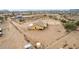 Desert home featuring an expansive fenced-in yard with a covered porch, trash receptacle area and a mountain view at 1600 W Ivar Rd, San Tan Valley, AZ 85144