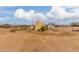 Fenced-in yard space, utility tanks, and camper visible at 1600 W Ivar Rd, San Tan Valley, AZ 85144