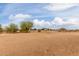 Expansive backyard featuring desert landscape and distant mountain views at 1600 W Ivar Rd, San Tan Valley, AZ 85144