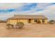 Charming single-story home with a three car garage and neutral exterior paint at 1600 W Ivar Rd, San Tan Valley, AZ 85144