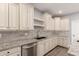 Bright kitchen features stainless steel appliances, granite countertops, and ample cabinet space at 1600 W Ivar Rd, San Tan Valley, AZ 85144
