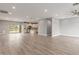 Open-concept living area with modern floors and plenty of natural light at 1600 W Ivar Rd, San Tan Valley, AZ 85144