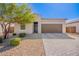 Charming single-story home featuring a low-maintenance front yard and a brick-paved driveway at 1653 W Toltec Dr, Coolidge, AZ 85128