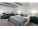 Comfortable bedroom with a large bed, sofa and stylish accent pillows at 2106 W Shawnee Dr, Chandler, AZ 85224