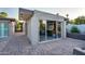 The studio boasts modern design with large windows offering views of the landscaped yard at 2106 W Shawnee Dr, Chandler, AZ 85224