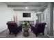 Cozy living room with comfortable seating, a fireplace, and stylish decor at 2106 W Shawnee Dr, Chandler, AZ 85224