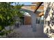 Picturesque courtyard featuring custom pergola, stucco archways, and ample area for outdoor seating at 2106 W Shawnee Dr, Chandler, AZ 85224