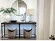 Nicely decorated entryway with decorative accents and a mirror, enhancing the welcoming ambiance at 22443 E Munoz St, Queen Creek, AZ 85142