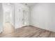 Bright, airy foyer with wood-look tile floors and a decorative glass front door at 2260 E Warbler Rd, Gilbert, AZ 85297