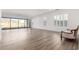 Bright living room with tile floors, large sliding glass doors, and white walls at 2260 E Warbler Rd, Gilbert, AZ 85297