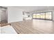 Open concept living area showcasing a bright kitchen and large sliding glass doors at 2260 E Warbler Rd, Gilbert, AZ 85297