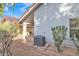 Backyard shows air conditioning unit and low maintenance landscaping at 2301 E Santa Rosa Dr, Gilbert, AZ 85234