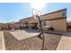 Nice backyard with an outdoor basketball hoop, patio, and garden at 2324 W Melody Dr, Phoenix, AZ 85041